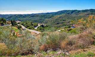 For sale: large building plot with panoramic sea and mountain views in a luxury estate in Benahavis, Marbella 7203 
