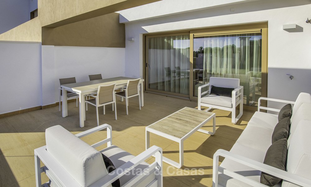 New, move-in ready, modern townhouses for sale on an acclaimed golf resort in Mijas, Costa del Sol. 10% discount! 15677