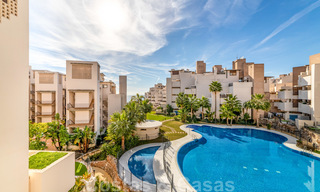 Modern apartment for sale in a frontline beach complex with sea views between Marbella and Estepona 25641 