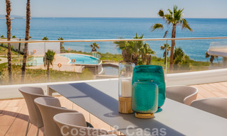 Spectacular modern luxury frontline beach apartments for sale in Estepona, Costa del Sol. Ready to move in. 27873 