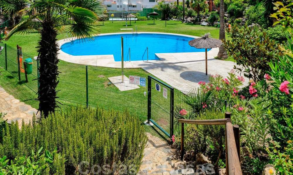 Redecorated townhouse for sale in a small frontline beach complex in Estepona West, close to the city 28121