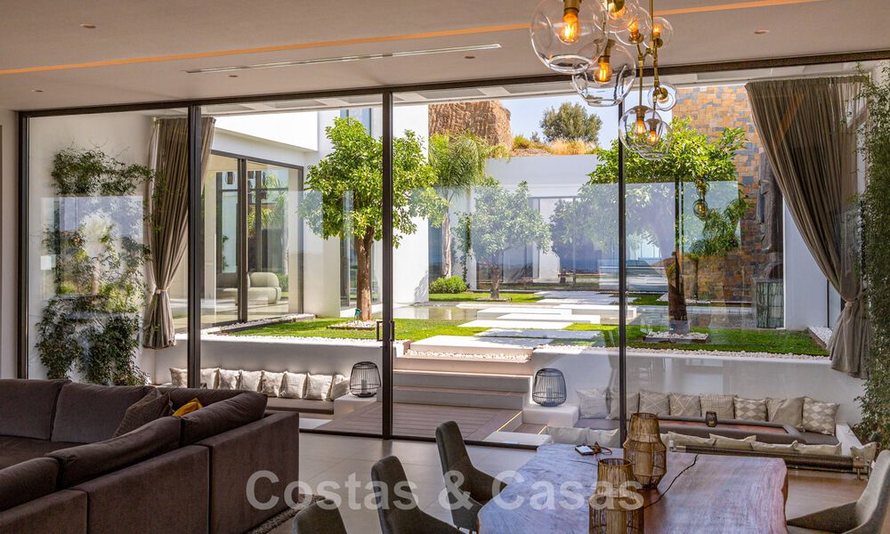 Phenomenal contemporary luxury villa for sale, directly next to the golf course with sea views in a gated golf resort in Marbella - Benahavis 43994