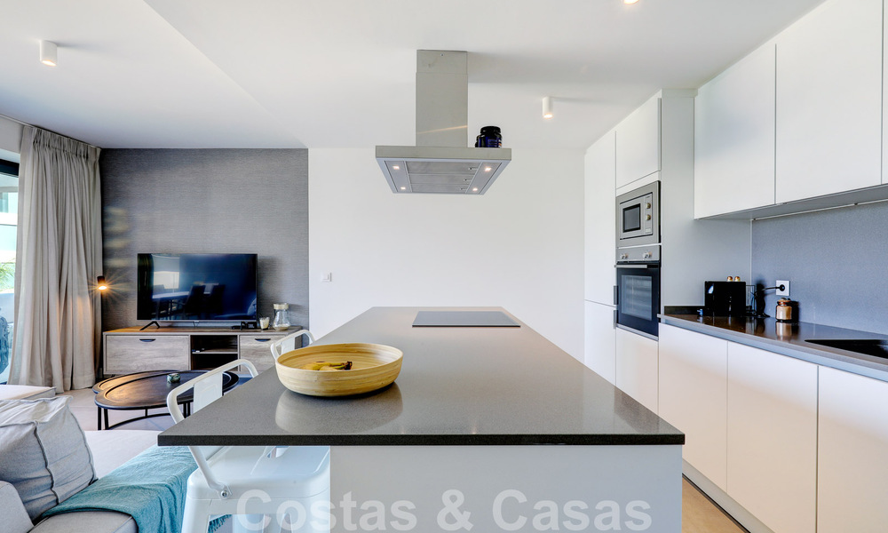 Move-in ready, modern 3-bedroom apartment for sale in a golf resort on the New Golden Mile, between Marbella and Estepona 50807