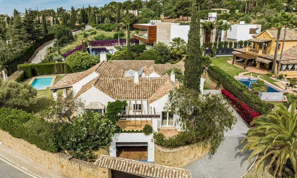 Luxury villa for sale in a Spanish architectural style in the prestigious gated urbanisation of Cascada de Camojan, Marbella 54860