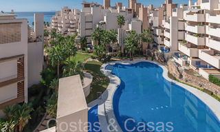 Contemporary duplex penthouse for sale in a first line beach complex with private pool between Marbella and Estepona 66578 
